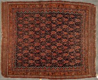 Lot 1058 - An early 20th Century Afshar rug, with boteh...