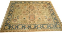 Lot 1061 - A modern Heriz style carpet, with floral...