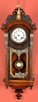 Lot 1068 - A Vienna walnut wall clock, with enamelled...