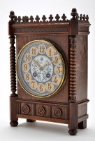 Lot 1074 - A late Victorian aesthetic movement oak cased...