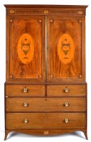 Lot 1117 - A George III mahogany converted linen press,...