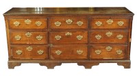 Lot 1118 - A large mid 18th Century oak chest of nine...