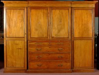 Lot 1123 - A George III style mahogany breakfront...