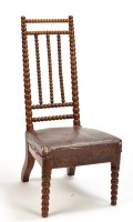 Lot 1145 - A Victorian oak nursing chair, the high...