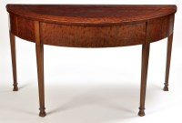 Lot 1153 - A George IV 'plum pudding' mahogany serving...