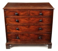 Lot 1157 - A George III mahogany chest of two short and...