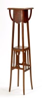 Lot 1166 - An Arts & Crafts oak jardiniere stand, the...