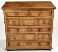 Lot 1184 - A Jacobean oak chest of five long graduated...