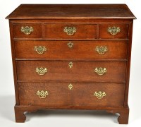 Lot 1186 - A mid 18th Century oak chest of three short...