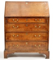 Lot 1192 - A mid 18th Century oak bureau, the fall-flap...