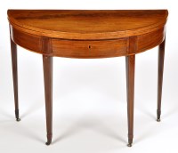 Lot 1202 - A George III mahogany turnover top card table,...