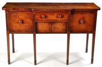 Lot 1205 - A late Georgian mahogany breakfront sideboard,...