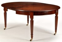 Lot 1206 - A mahogany D-end extending dining table, the...