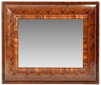 Lot 1211 - An oyster veneered wall mirror, the...