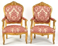 Lot 1220 - A pair of Louis XV style armchairs, each in...