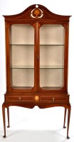 Lot 1237 - An Edwardian mahogany display cabinet on stand,...