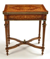 Lot 1238 - A Continental walnut turnover swivel top card...