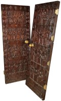 Lot 1250 - A pair of African hardwood doors, each carved...