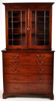 Lot 1259 - A George III mahogany secretaire cabinet, the...