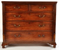 Lot 1263 - A late George III mahogany chest of two short...