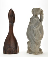 Lot 22 - An African stone carving of a mother and child,...