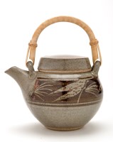 Lot 30 - A Japanese style stoneware teapot, decorated...