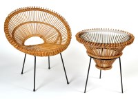 Lot 109 - A rattan and wrought metal scoop pattern chair...