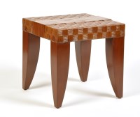 Lot 129 - A 'Rhino' end table, brown rattan and bamboo,...