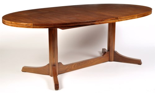 Lot 136 - A rosewood dining table, probably by Archie...
