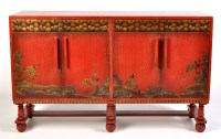 Lot 138 - A 1930's red painted oak sideboard, decorated...