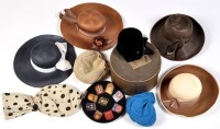 Lot 153 - A quantity of mid 20th Century and later hats,...