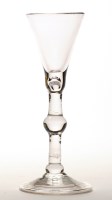 Lot 286 - An 18th Century wine glass, the trumpet bowl...
