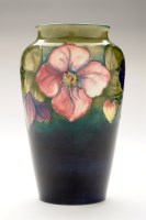 Lot 338 - Walter Moorcroft: a Clematis pattern vase of...