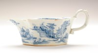 Lot 344 - A Bow blue and white sauce boat, with leaf...