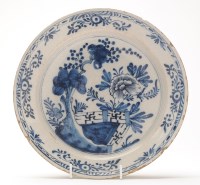 Lot 346 - An 18th Century delft charger, typically...