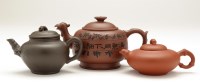 Lot 375 - Three Yixing teapots, late 19th/20th Century,...