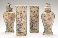 Lot 391 - A Garniture of crackle glazed vases, early...