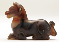 Lot 395 - A carved agate recumbent horse, in Ming style,...