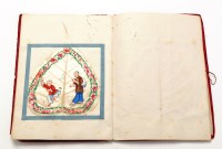 Lot 404 - A silk covered album containing twelve Chinese...