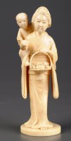 Lot 417 - A Japanese Meji period carved ivory okimono,...