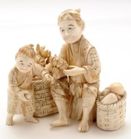 Lot 424 - A Japanese carved ivory okimono, Meji period...