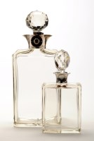 Lot 457 - A George V silver-mounted glass locking...