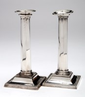 Lot 468 - A pair of Edwardian candlesticks, by I.S....