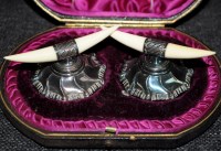 Lot 557 - A pair of late Victorian silver and ivory...