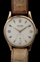 Lot 633 - Rolex: a gentleman's 9ct. gold cased...