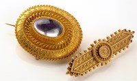 Lot 650 - An Etruscan style yellow metal brooch,...