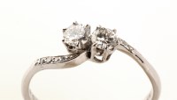 Lot 656 - A diamond ring, the two brilliant cut diamonds...