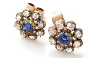 Lot 670 - A pair of sapphire and diamond cluster stud...