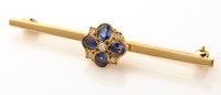 Lot 678 - A sapphire, diamond and 9ct. yellow gold bar...