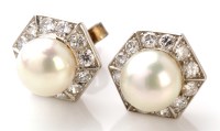 Lot 679 - A pair of pearl and diamond stud earrings,...